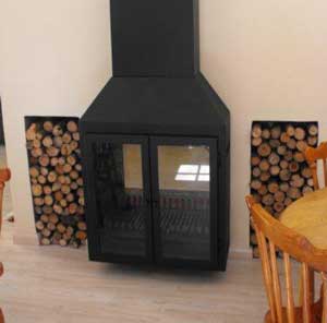 Double-sided fireplace - freestanding on one side, built-in on the other side.
